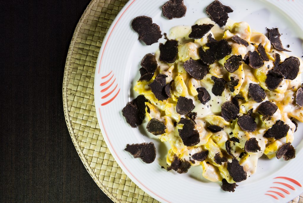 Food Photography - Tortellini on fondue with black truffles